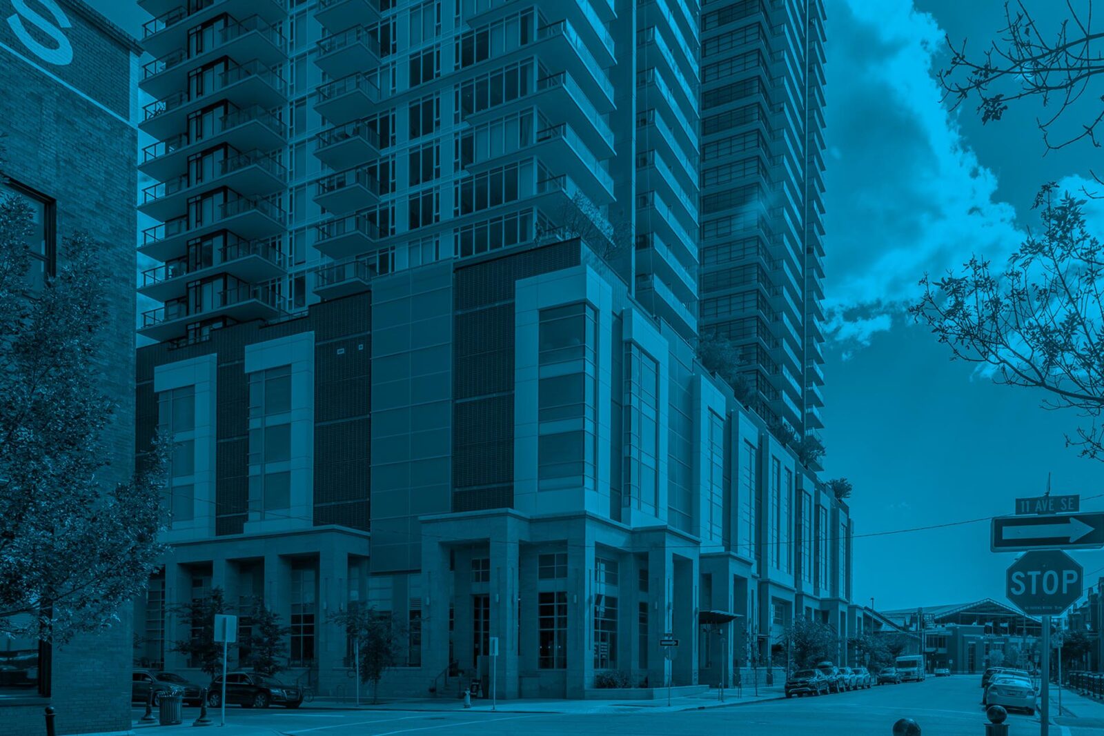 Condominium building exterior representing condo association management, with modern residential towers and shared community property maintained by a condominium association.